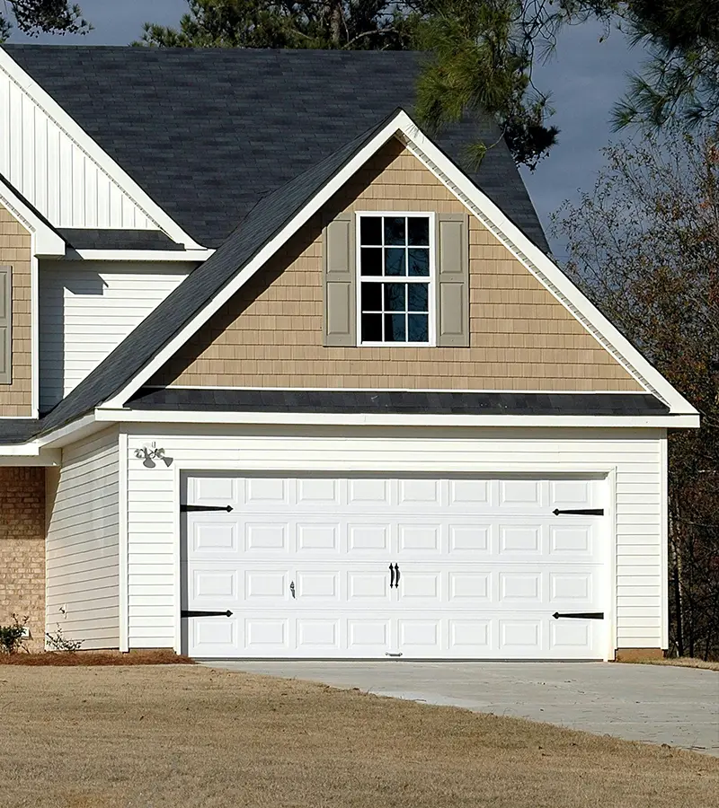 White garage doors with windows for style and light